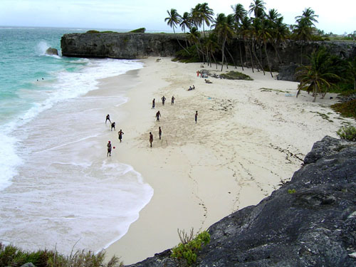 Playing soccer at the beach