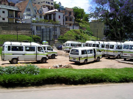 The local transportation buses are uniformly painted now