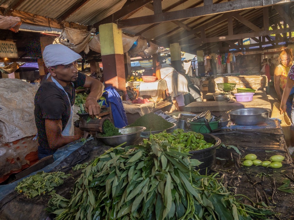 Grinding manioc leaves (Talatamaty)